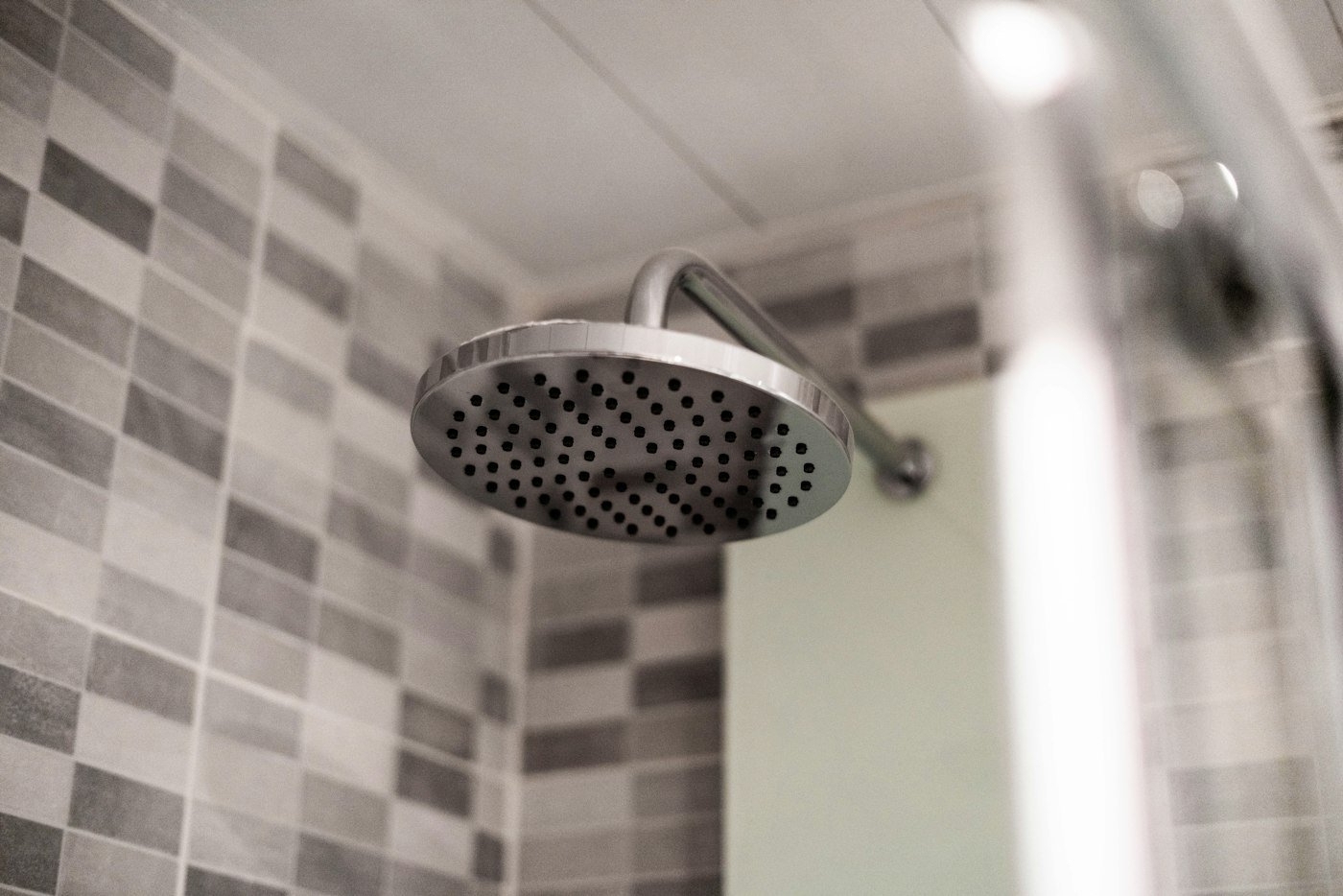 Shower head in a bathroom with low water pressure
