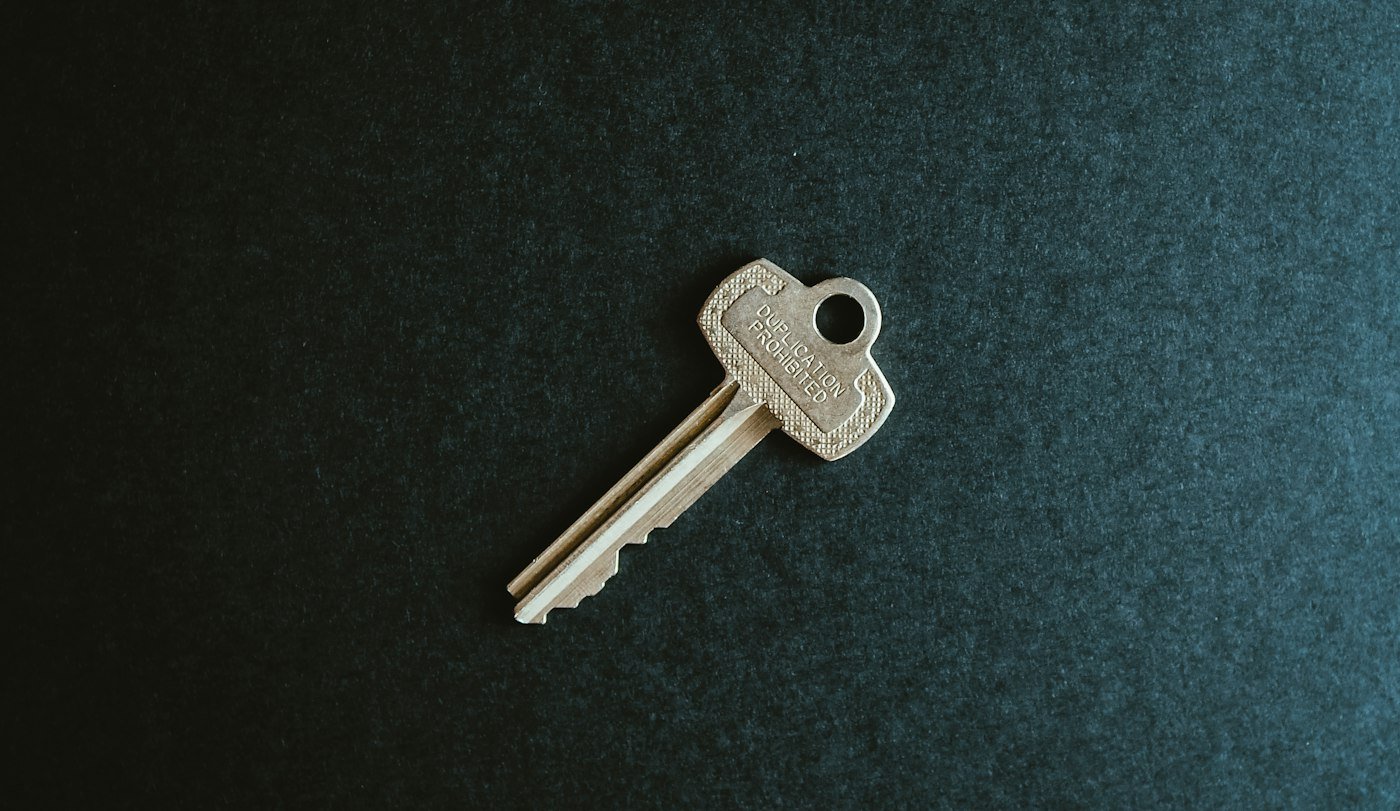 Close-up of a door key for a rental property