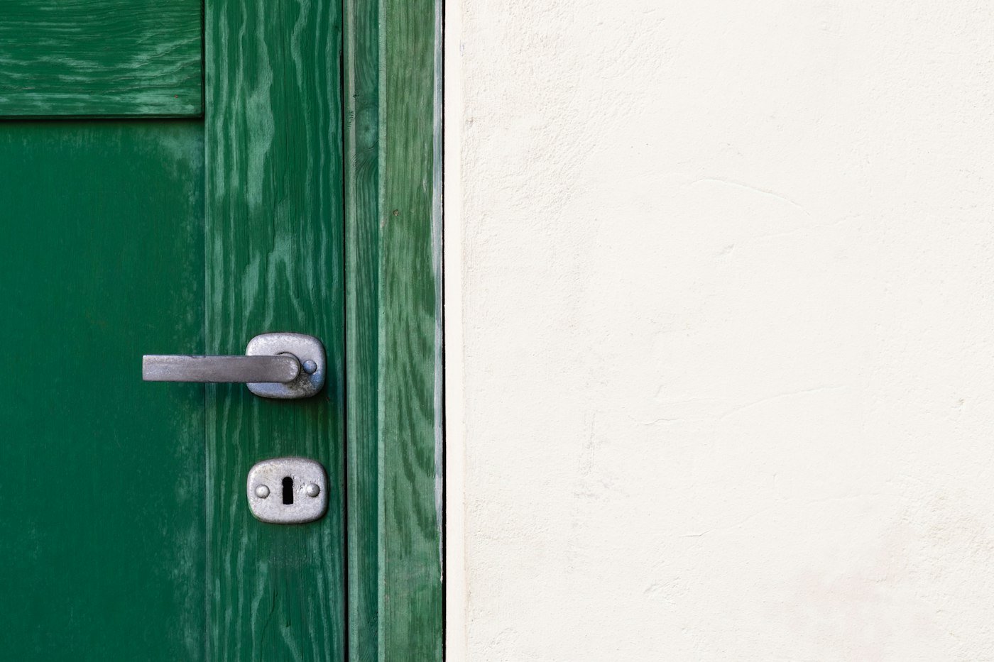 Painted front door with handle and lock