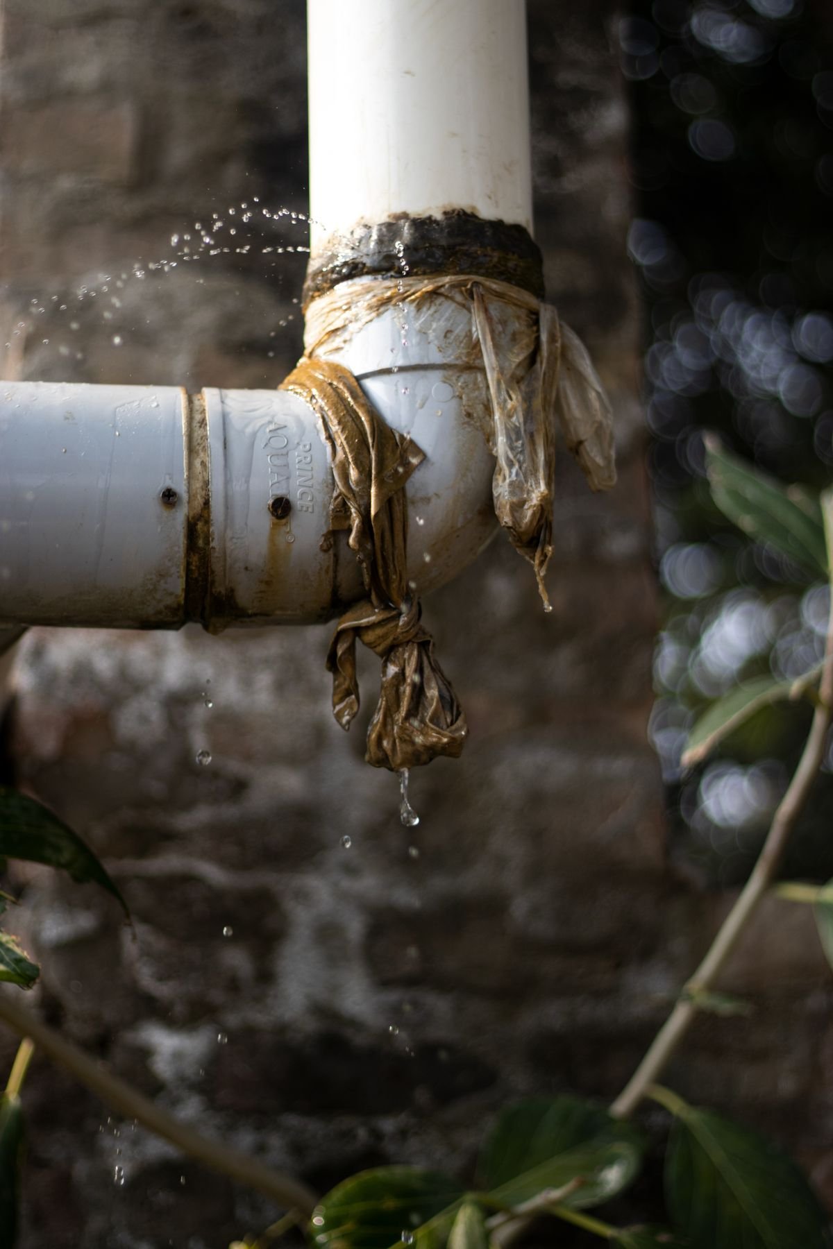Plumber in Hackney repairing pipework