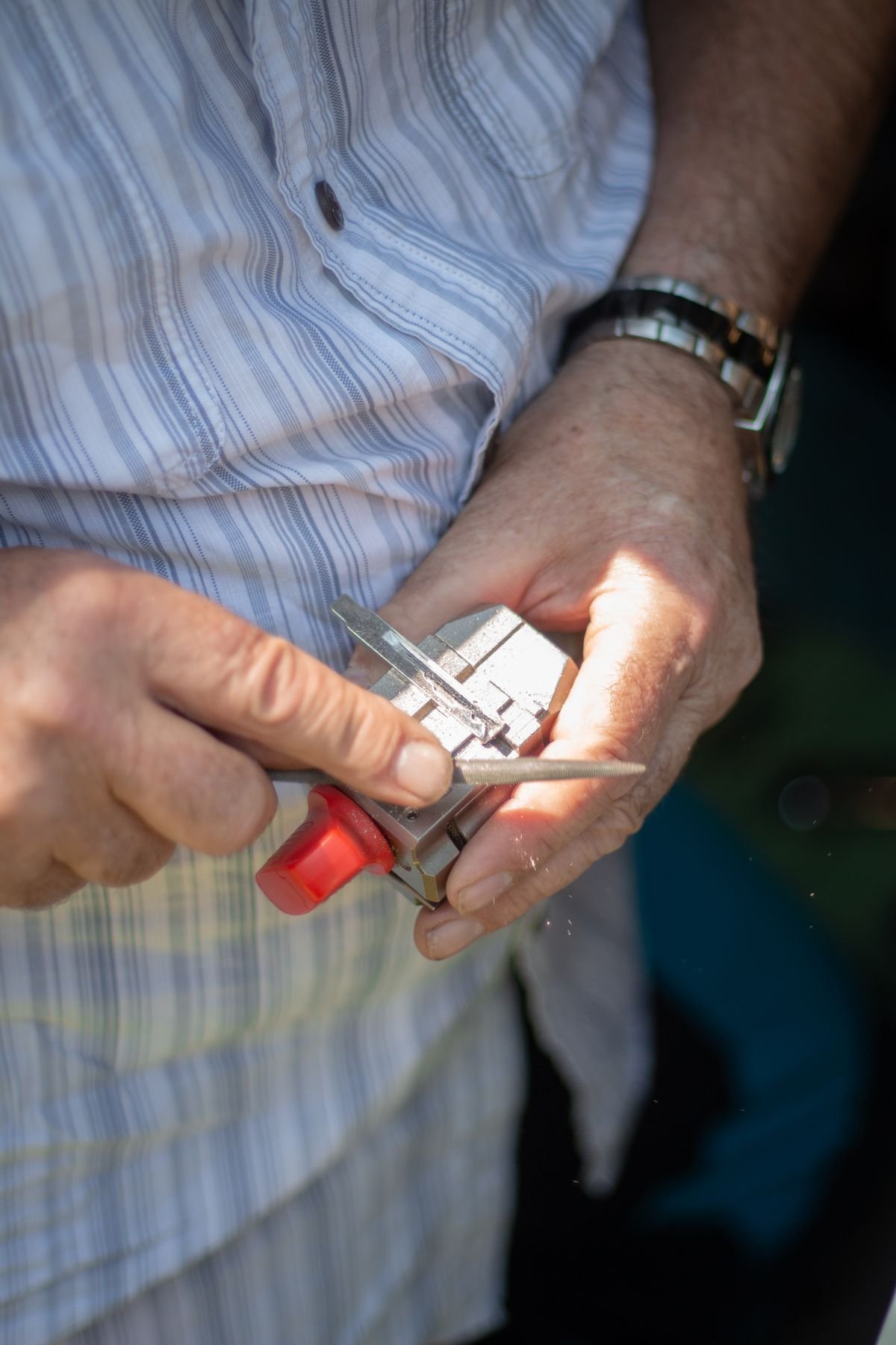 Locksmith in Ascot fitting a door lock