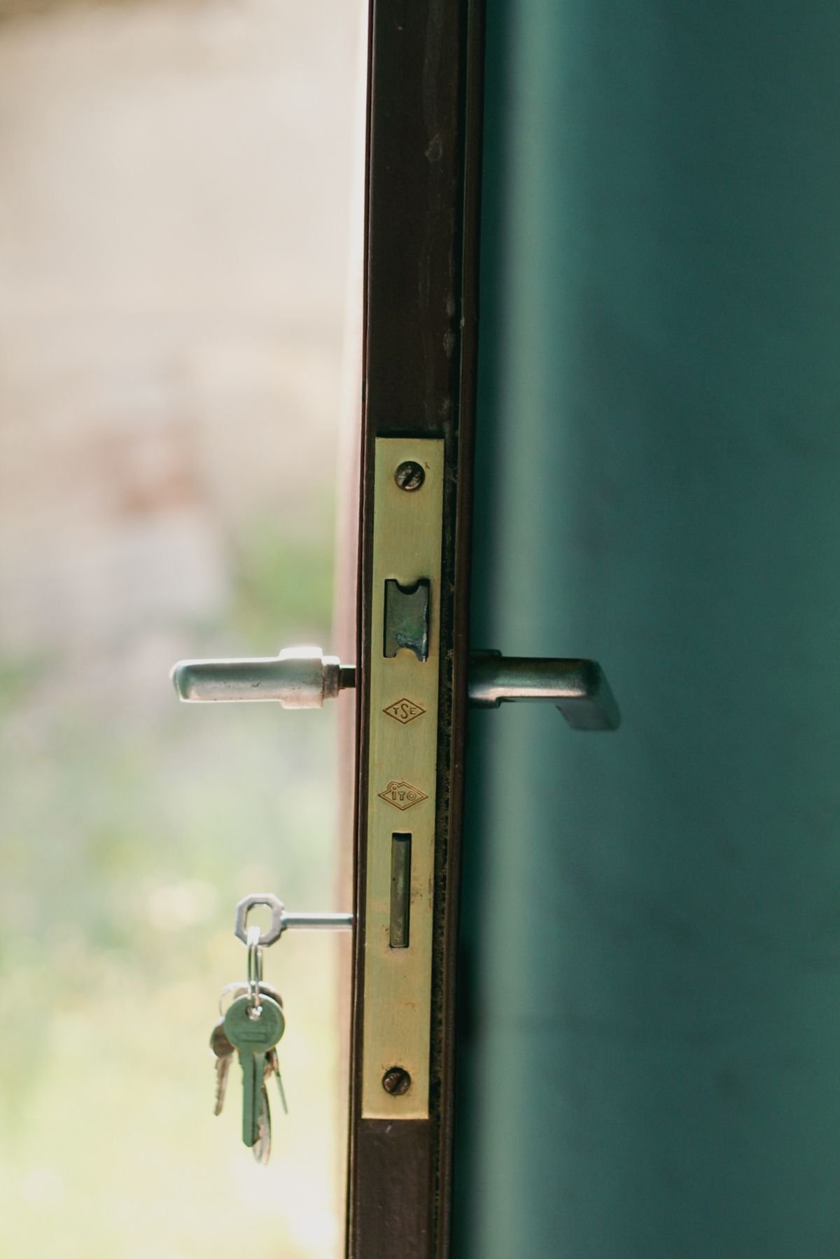 Locksmith opening a front door lock