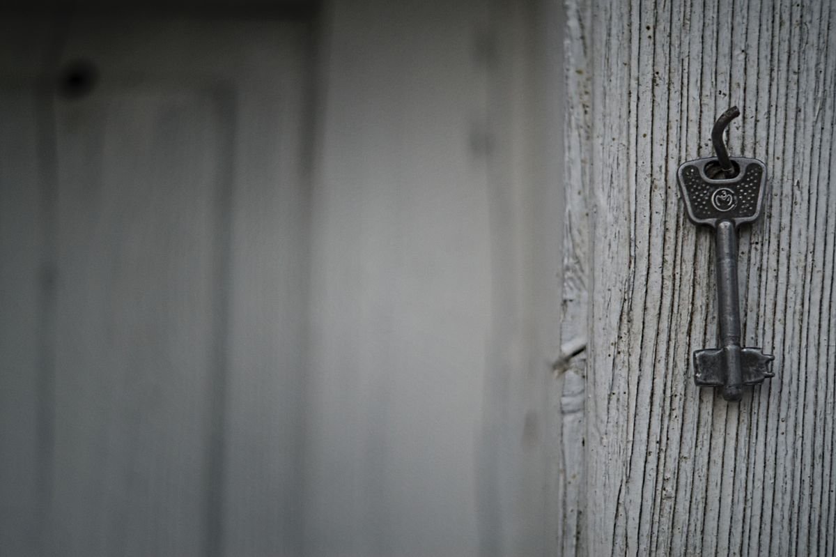 Locksmith working on a front door lock