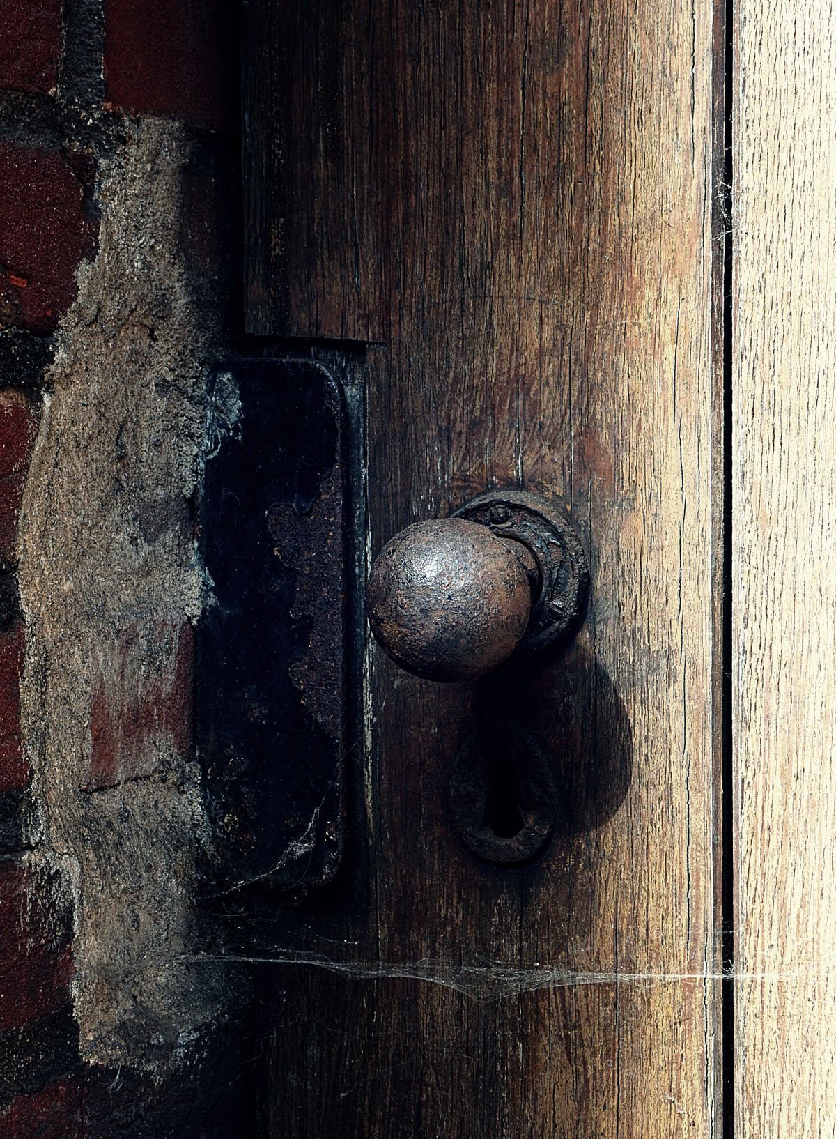Locksmith fitting a new British Standard lock