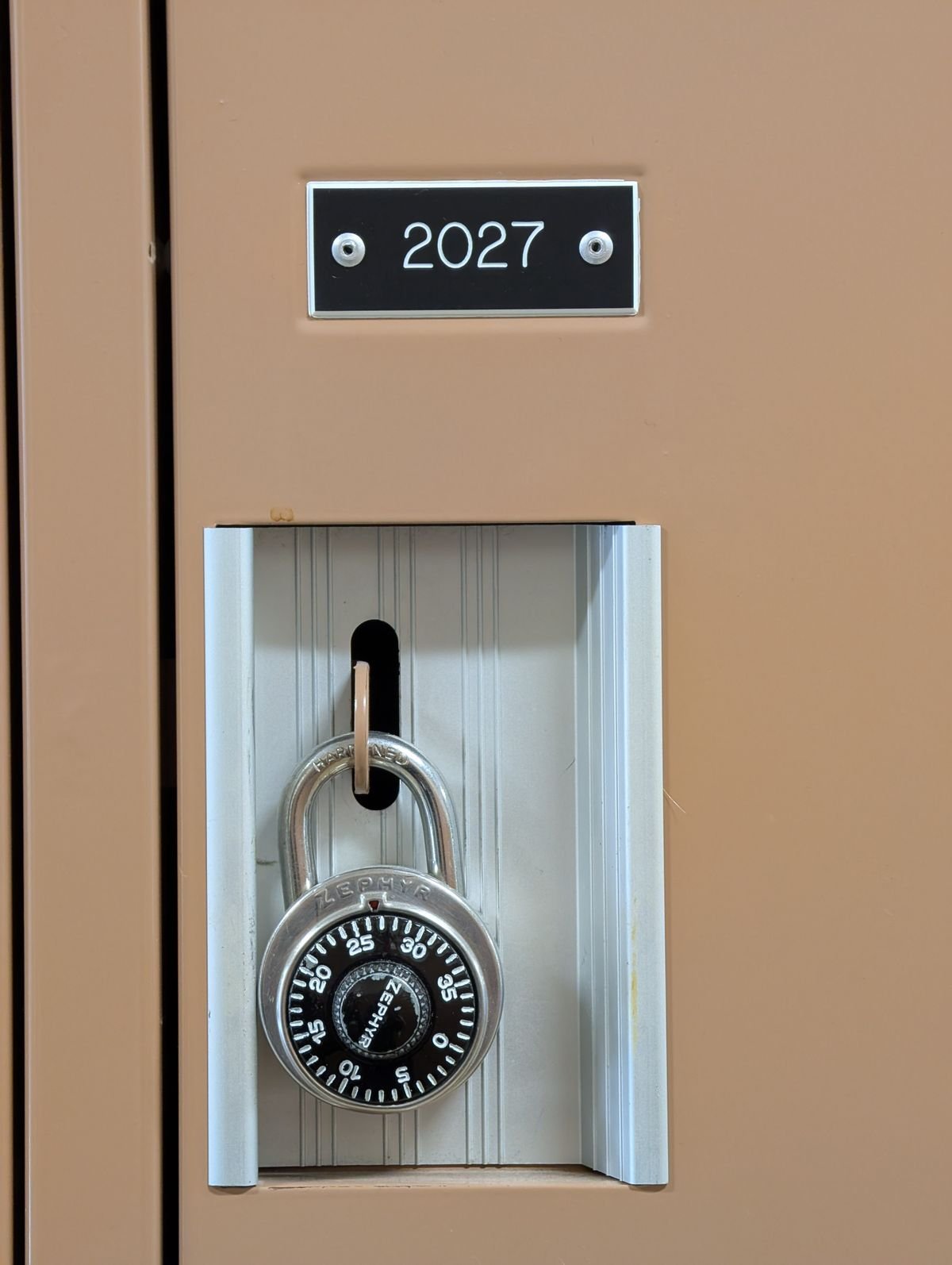 Locksmith in Woking fitting a door lock