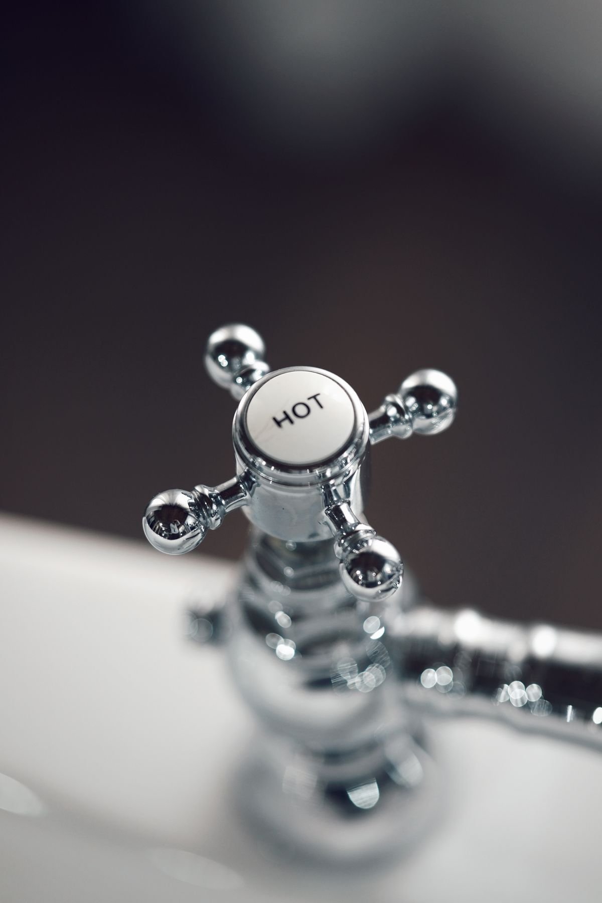 Tap and toilet repair in Esher