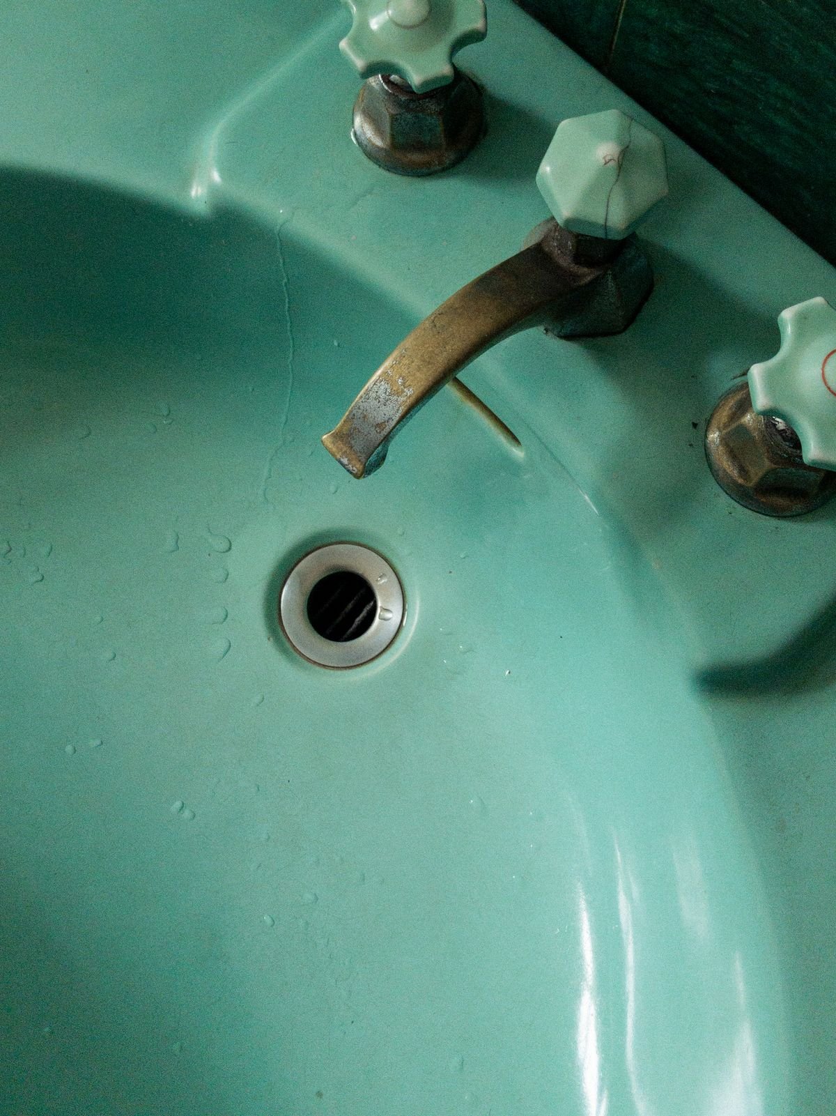 Bathroom basin and tap fitted by a plumber