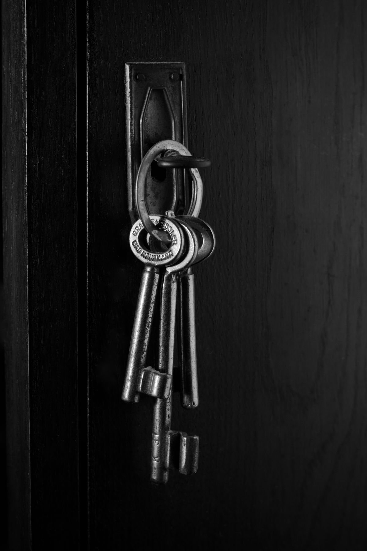 Locksmith in Oxshott fitting a door lock