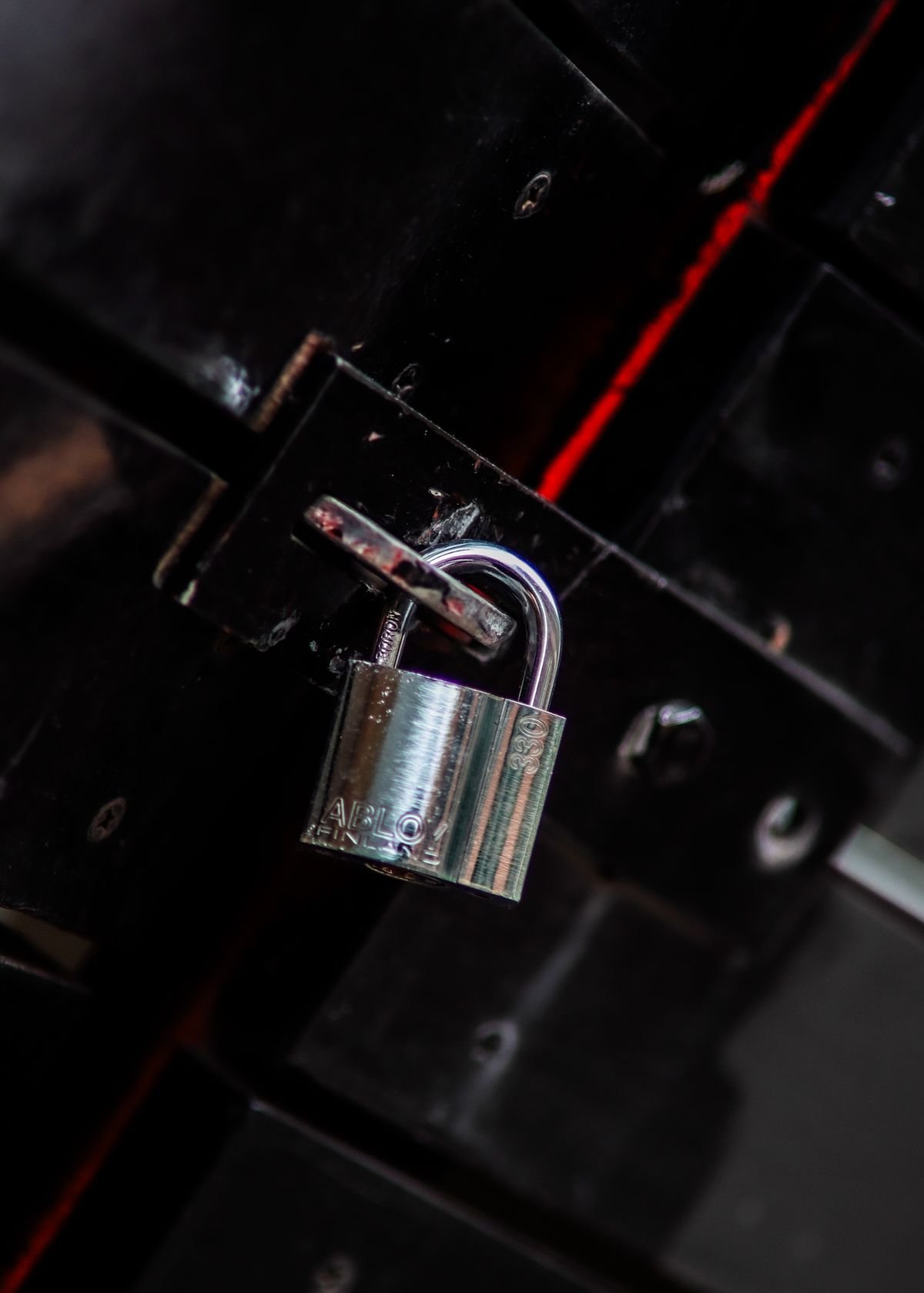 Locksmith in Chelsea fitting a door lock