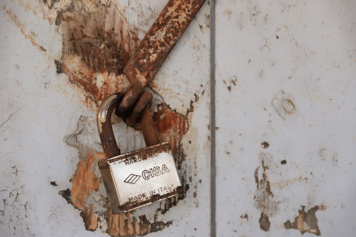 Locksmith in Richmond fitting a door lock