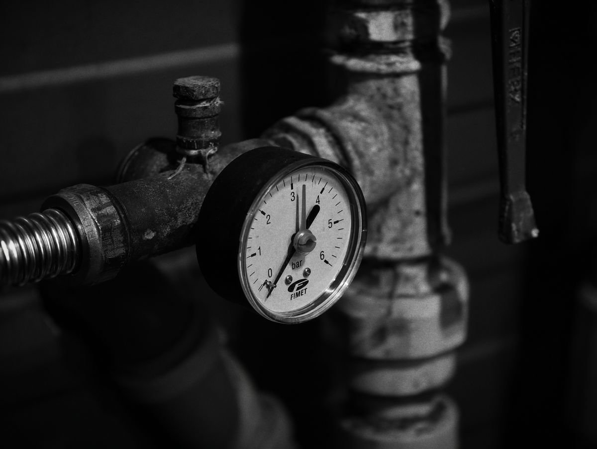 Plumber in Leatherhead repairing pipework