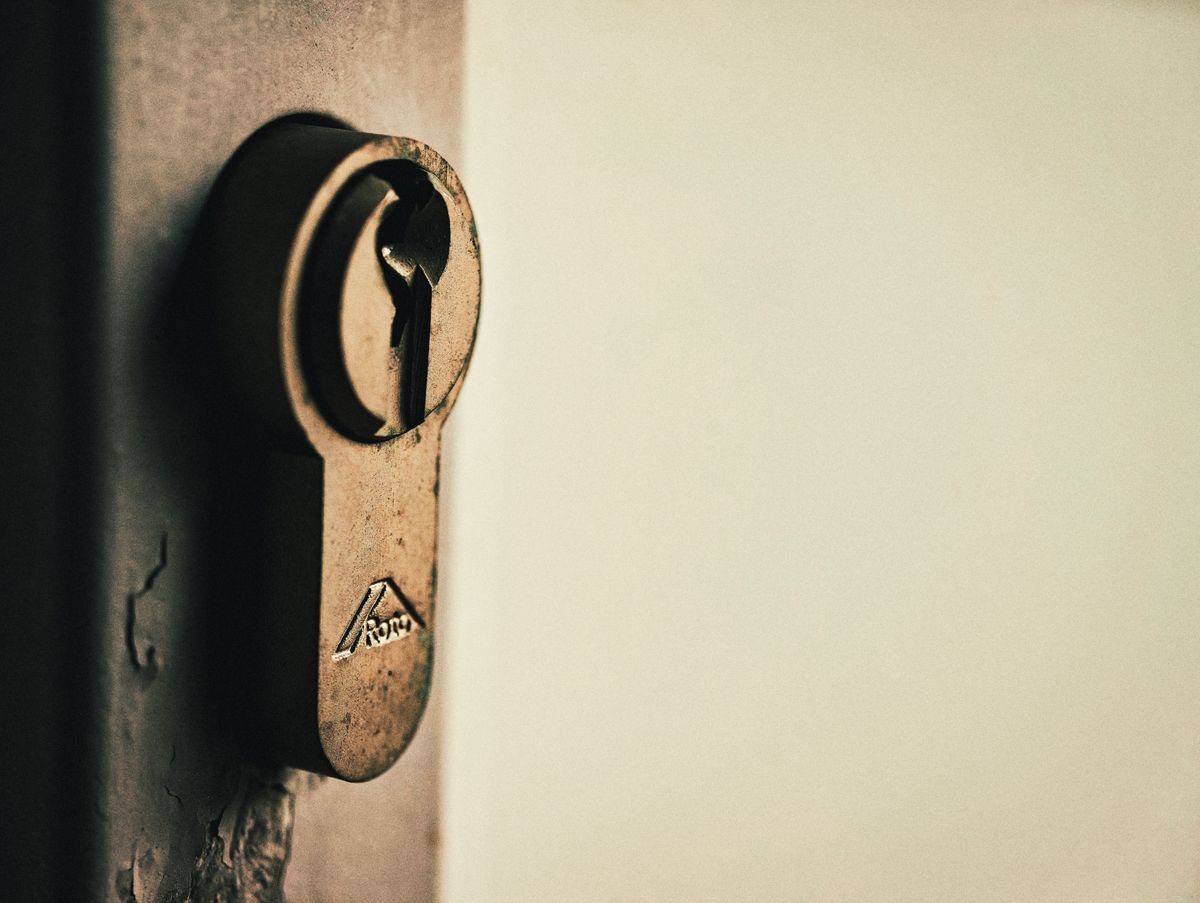 Locksmith in Beaconsfield fitting a door lock