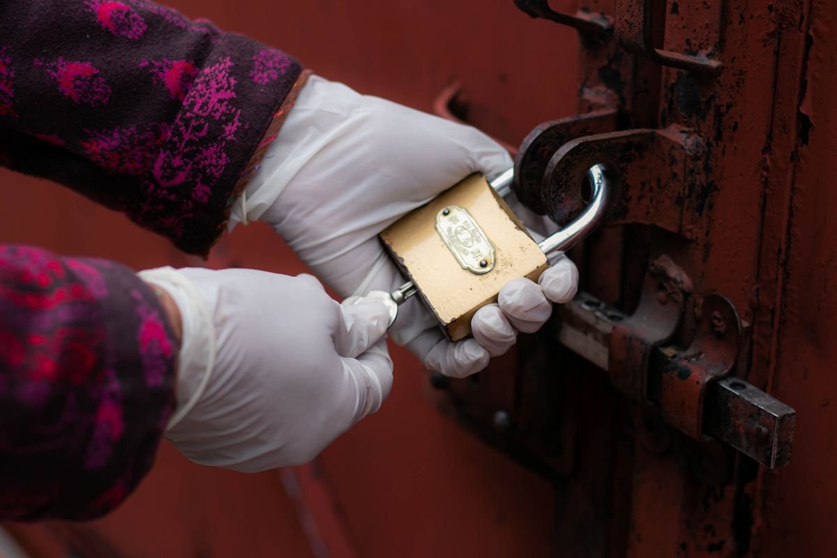 Locksmith in Amersham fitting a door lock
