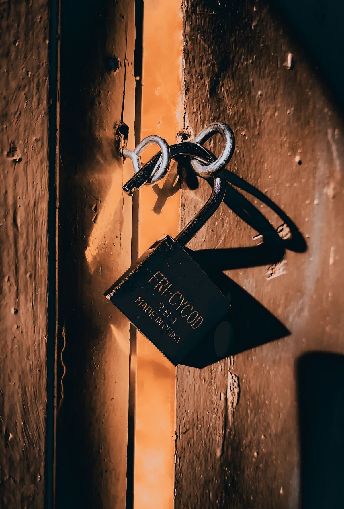 Locksmith repairing a uPVC door lock